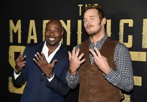 Antoine Fuqua (left), director of the upcoming film The Magnificent Seven, poses backstage with cast member Chris Pratt during the Sony Pictures Entertainment presentation at CinemaCon 2016 in April. Photo: AP