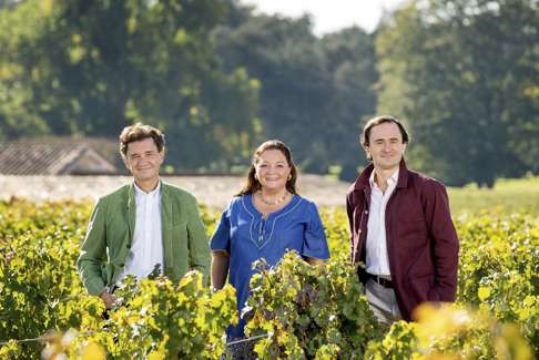 From left: Philippe Sereys de Rothschild, Camille Sereys de Rothschild and Julien de Beaumarchais in their vineyard in Pauillac. Photo: AFP