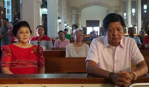 Philippine vice-presidential candidate and senator Ferdinand “BongBong” Marcos (right), son and namesake of late dictator former President Ferdinand Marcos, attends a mass with his mother, former first lady Imelda Marcos, before casting his vote in Batac, Ilocos Norte province,. Photo: Reuters