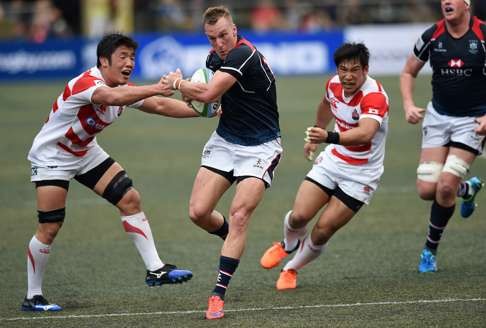 Hong Kong’s Alex McQueen in action against Japan. Photo: AFP
