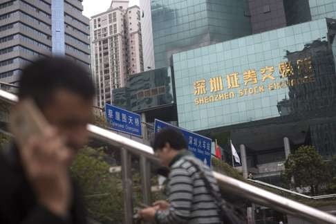 In the Shenzhen CBD, offices formerly leased to P2P company Ezubao havejust been transferred to GF Securities. Photo: EPA