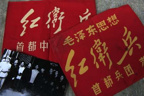 Red Guard armbands and an old photo from the Cultural Revolution belonging to a former Red Guard. Photo: EPA