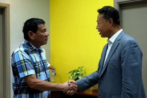 Philippine presumptive president-elect Rodrigo Duterte (left) meeting with Chinese ambassador to the Philippines Zhao Jianhua during a courtesy call in Davao city, southern Philippines, 16 May 2016. Photo: EPA