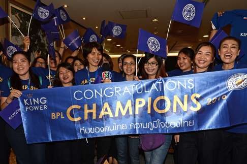 A day to cherish for Thai fans of Leicester City as the team touched down in Bangkok. Photo: AFP