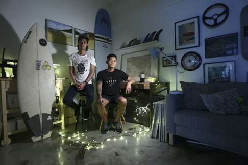 Surfers Justin Potter (left) and Bryant Vallejo of Float Captain, at their studio in Wong Chuk Hang. Photo: Jonathan Wong