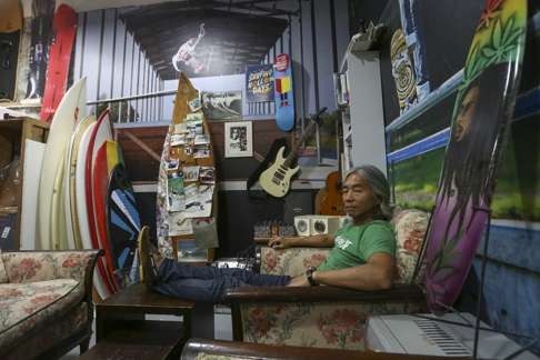 Surfer Ken Choi at his Xgame shop in Chai Wan. Photo: Jonathan Wong
