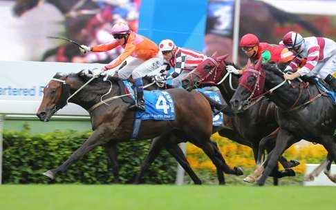 Helene Super Star, ridden by Douglas Whyte, wins the Standard Chartered Champions & Chater Cup last year. Photo: Kenneth Chan