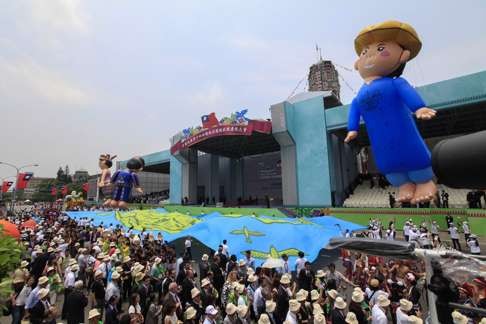 The crowd celebrates Tsai Ing-wen’s inauguration. Photo: EPA