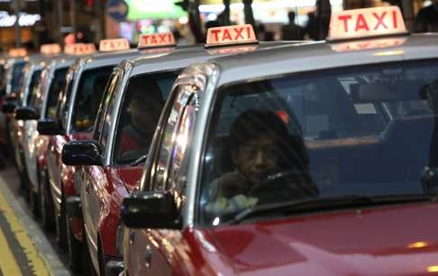 Taxi queue up to wait passenger at Causeway Bay. Photo: May Tse