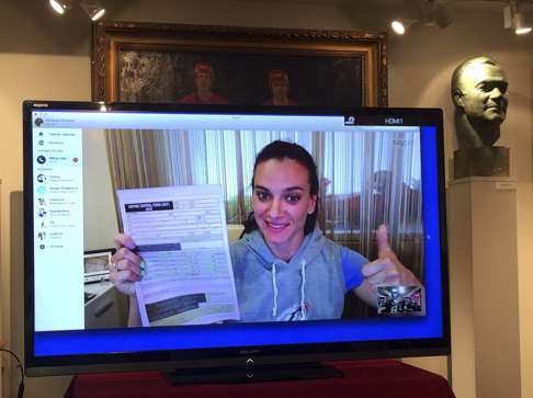 Yelena Isinbayeva, a Russian pole vaulter, a two-time Olympic gold medalist and a three-time World Champion speaks with journalists at Moscow’s CSKA sports complex via Skype from her home city of Volgograd in Moscow, Russia, Monday, May 23, 2016. Isinbayeva plans to file suit if Russia's ban from global track and field competition remains in place and she is barred from competing at the games in Rio de Janeiro. (AP Photo/James Ellingworth)