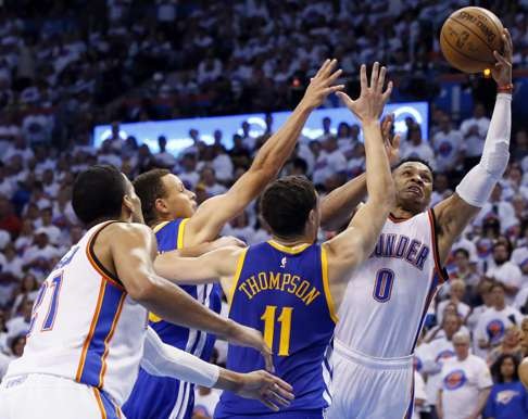 Oklahoma City Thunder guard Russell Westbrook (0) goes after a loose ball. Photo: AP