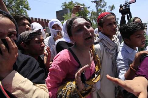 Transgender mourners react on Thursday to the killing of activist Alisha who died of gunshot wounds at a hospital in Peshawar. Photo: EPA