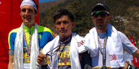 Winner Bhim Gurung (Nepal) is flanked by second-placed Tadei Pivk (Italy) and third-placed Marc Casal Mir (Andorra) after the 2016 Yading Skyrun.