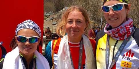 Winner Megan Kimmel (US) is flanked by second-placed Zhen Wenrong (China) and third-placed Ragna Debats (Netherlands) after the 2016 Yading Skyrun.