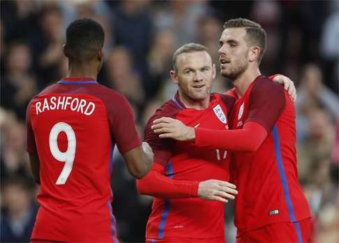 England skipper Wayne Rooney was also on target. Photo: Reuters