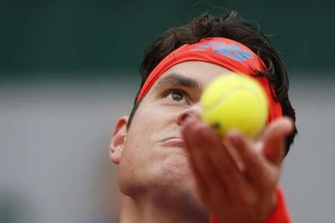 Milos Raonic struggles in Paris. Photo: Reuters