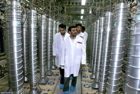 Then-Iranian president Mahmoud Ahmadinejad visits the Natanz uranium enrichment facility - the target of Stuxnet malware planted by the US. Photo: AP