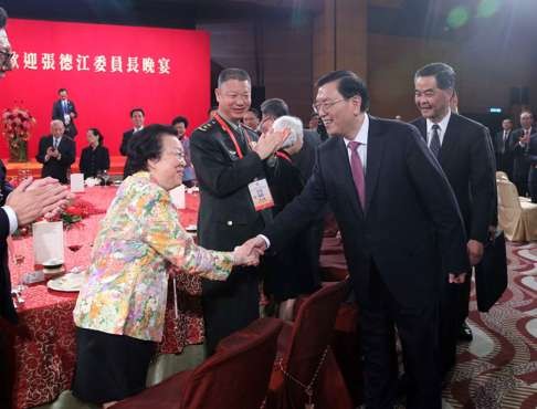 NPC Standing Committee chairman Zhang Dejiang attends a banquet in his honour in Hong Kong. He made it clear on his trip to the city that the central government is determined to uphold the “one country, two systems” principle for Hong Kong. Photo: Xinhua