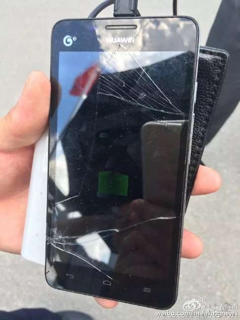 Lawyer Wu Liangshu says his phone was damaged in the incident. Photo: SCMP Pictures