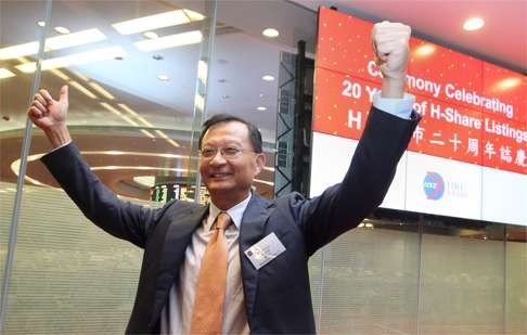 Sun Mingbo, chairman of Tsingtao Brewery, celebrates 20 years of H share listings in Hong Kong in 2013. Photo: May Tse