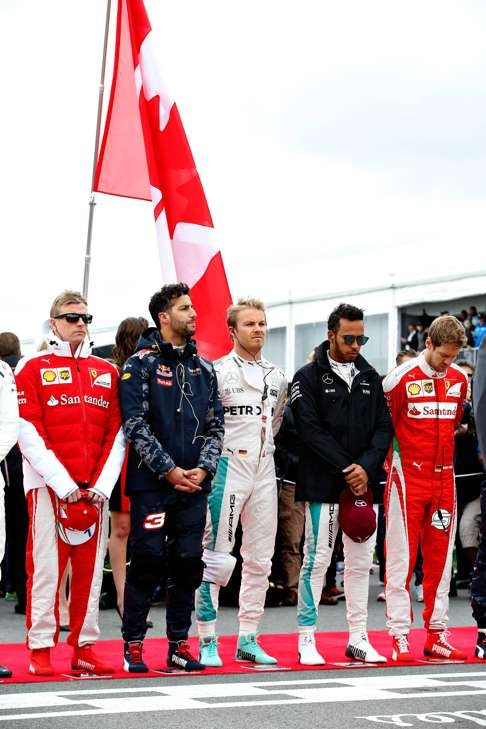 Kimi Raikkonen, Daniel Ricciardo, Nico Rosberg, Lewis Hamilton and Sebastian Vettel line up for the national anthem during the Canadian Formula One Grand Prix. Photo: AFP