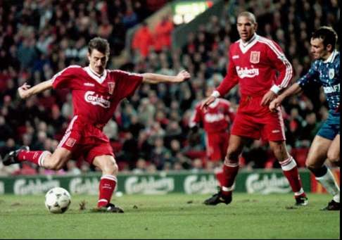 Liverpool's veteran striker Ian Rush scores during his 100th FA Cup goal during their third round tie against Rochdale at Anfield Stadium in 1996. PhotAP Photo/Dave Kendall) *UNITEDKINGDOM OUT*