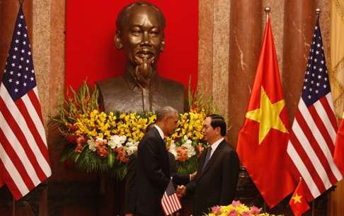 US President Barack Obama shakes hands with his Vietnamese counterpart Tran Dai Quang during a signing ceremony at the Presidential Palace in Hanoi last month. The US has lifted a long-standing ban on weapons exports to Vietnam. Photo: AFP