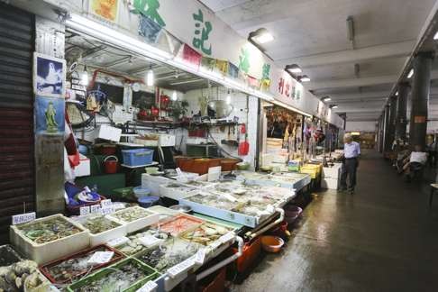 Fresh fish and seafood stall in North Point.