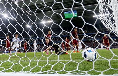 Russia goalkeeper Igor Akinfeev, foreground center, reacts after Slovakia's Marek Hamsik scored his side's second goal (AP Photo/Frank Augstein)