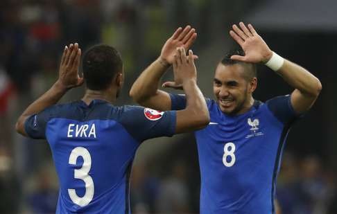 France's Dimitri Payet celebrates with Patrice Evra at the end of the match REUTERS/Yves Herman Livepic