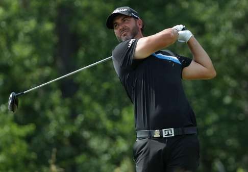 Scott Piercy plays his shot from the fourth tee during the final round of the US Open. Photo: AFP