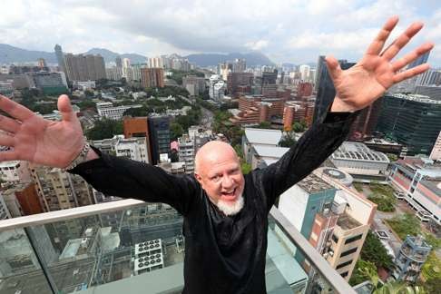 Swedish son: Anders Nelsson pretends to be delighted at turning 70 in Hong Kong. Photo: Felix Wong