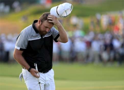 Shane Lowry of Ireland reacts after finishing the US Open at Oakmont Country Club. Photo: EPA
