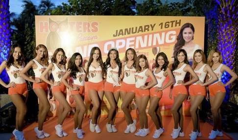 Female employees at January’s opening of Hooters Pattaya, in Thailand.