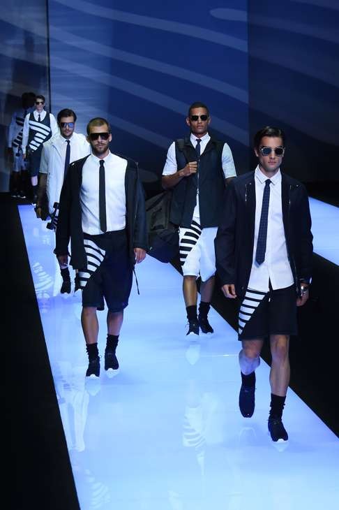 Looks from Giorgio Armani’s spring/summer 2017 menswear collection. Photo: AFP