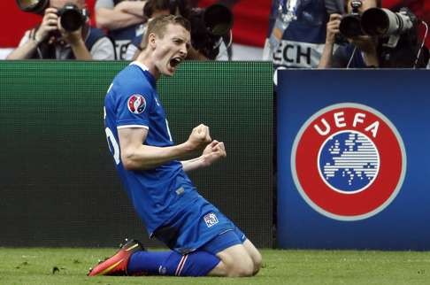 Iceland forward Jon Dadi Bodvarsson celebrates scoring the first goal AFP PHOTO / ODD ANDERSEN