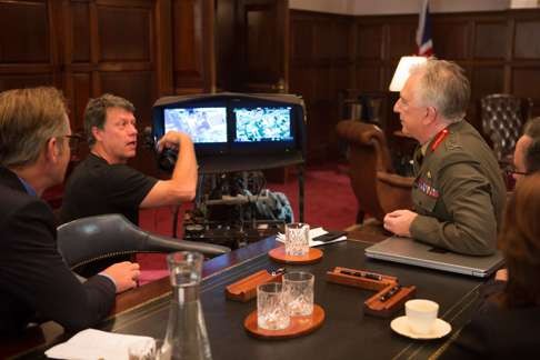 Director Gavin Hood (left) and Alan Rickman on the set of Eye in the Sky.