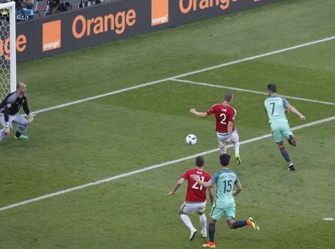 Cristiano Ronaldo (R) of Portugal flicks in to make it 2-2 EPA