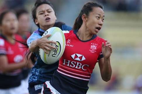Chong Ka-yan makes a break during Hong Kong’s 38-0 win over Guam on day one of the Asia Rugby Sevens Qualifier second leg in Tokyo. Photos: HKRU