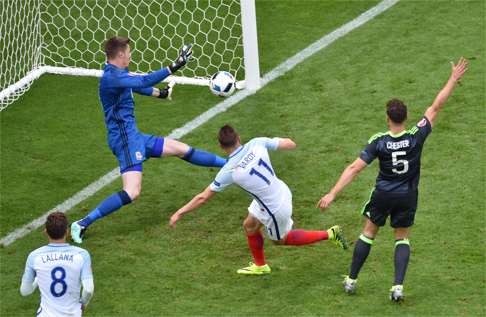 Jamie Vardy scores the equaliser against Wales at Euro 2016. Photo: AFP