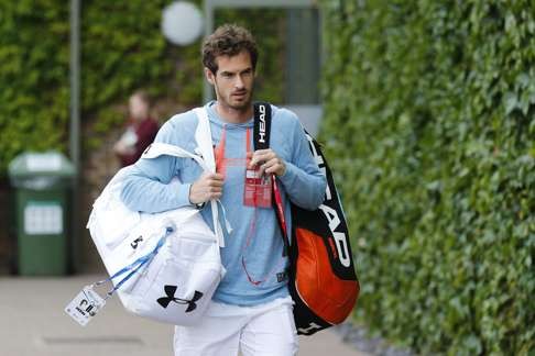 Britain's Andy Murray arrives for a training session at the All England Lawn Tennis Championships in Wimbledon. Photo: EPA