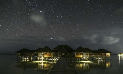 The night sky behind the lodgings in Gili Lankanfushi, Maldives.