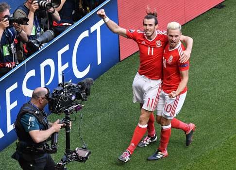 Gareth Bale (L) and Aaron Ramsey of Wales celebrate EPA