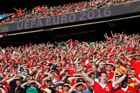 Wales supporters cheer their team AFP PHOTO / Thomas SAMSON