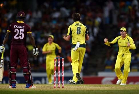 Mitchell Marsh celebrate dismissing West Indies batsman Johnson Charles.