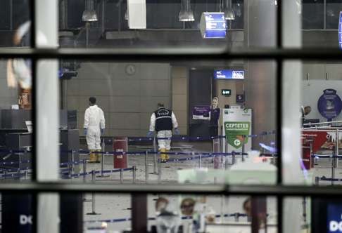 Police investigators scour for clues after the attack at Ataturk Airport in Istanbul. Photo: EPA