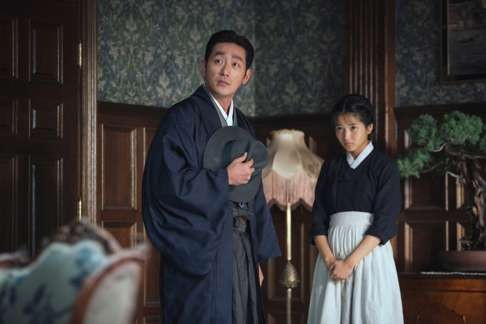 Ha Jung-woo and Kim Tae-ri in a scene from The Handmaiden.