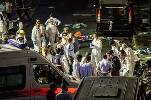 Forensic police examine a blast site at Ataturk airport. Photo: AFP