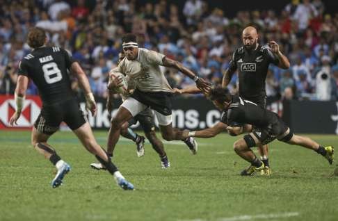 Fiji's Semi Kunatani is tackled by New Zealand's Lewis Ormond during the Cathay Pacific/HSBC Hong Kong Sevens 2016 Cup Final.