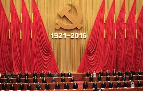 Leaders of the Communist Party celebrate its founding anniversary in the Great Hall of the People in Beijing on Friday. Photo: AP